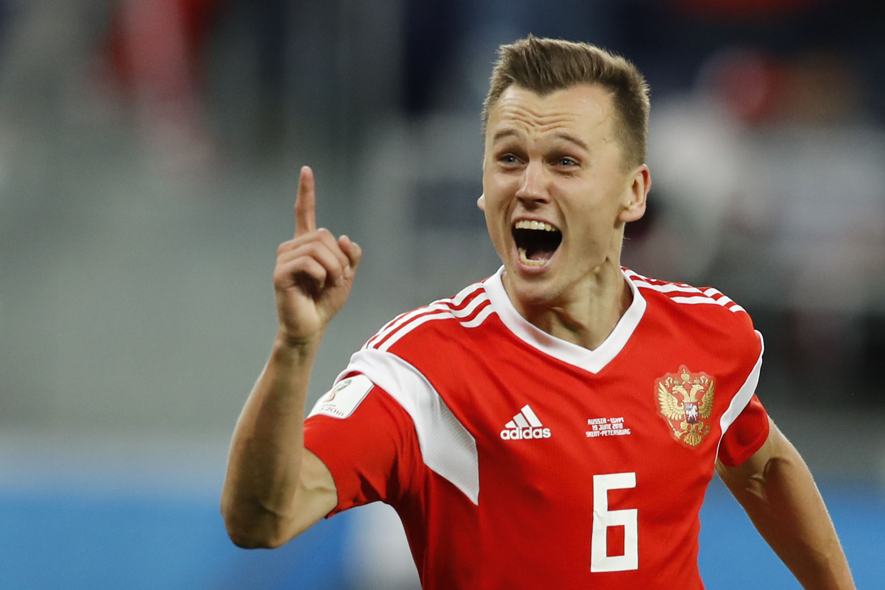 Russia's Denis Cheryshev celebrates